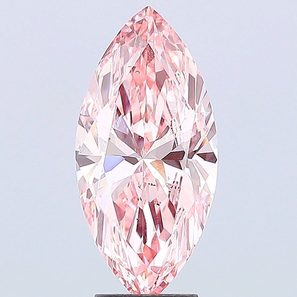 Loose Diamond - MARQUISE 4.15ct Fancy Vivid Pink VS1: Loose Diamond - MARQUISE 4.15ct Fancy Vivid Pink VS1 Source: This is a real non-mined Diamond that has been grown in a lab Shape: MARQUISE Carats: 4.15 Color: Fancy Vivid Pink Certification: IGI Video