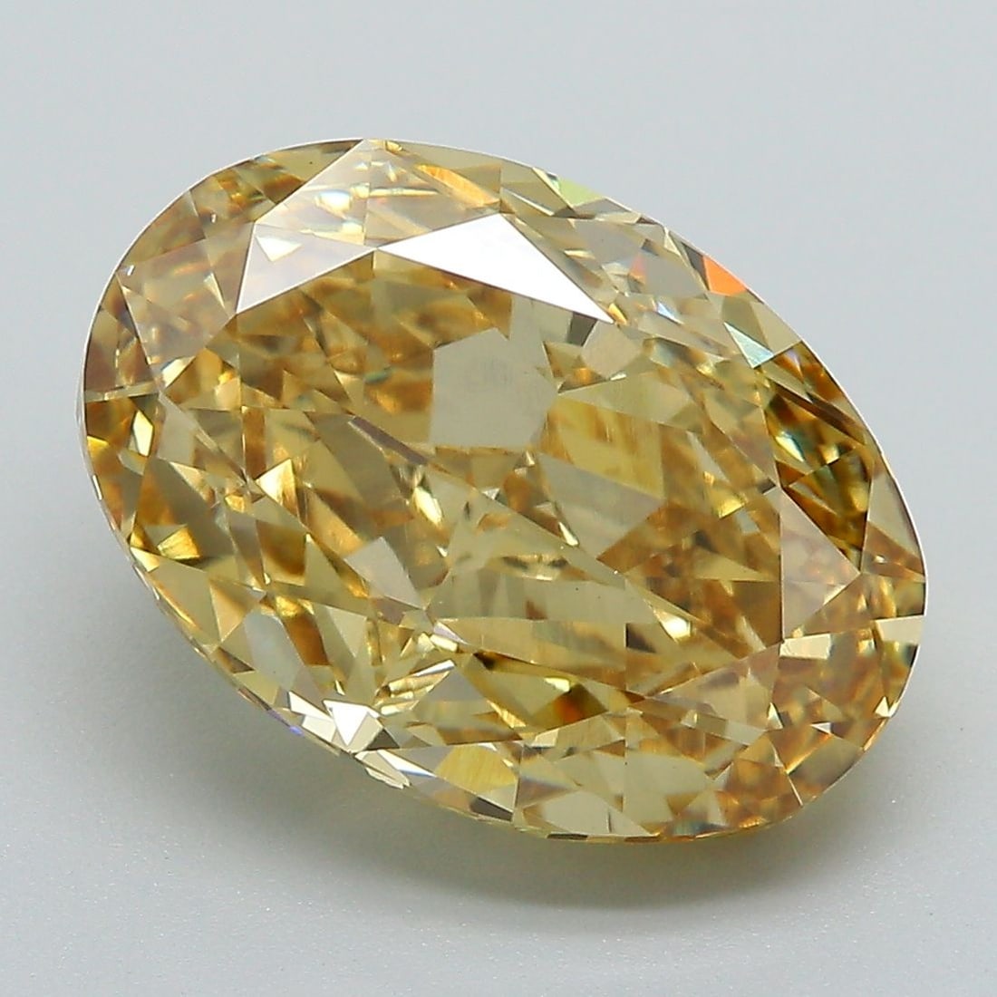 Loose Diamond - OVAL 7.05ct Fancy Vivid Yellow VS1: Loose Diamond - OVAL 7.05ct Fancy Vivid Yellow VS1 Source: This is a real non-mined Diamond that has been grown in a lab Shape: OVAL Carats: 7.05 Color: Fancy Vivid Yellow Certification: IGI Video:
