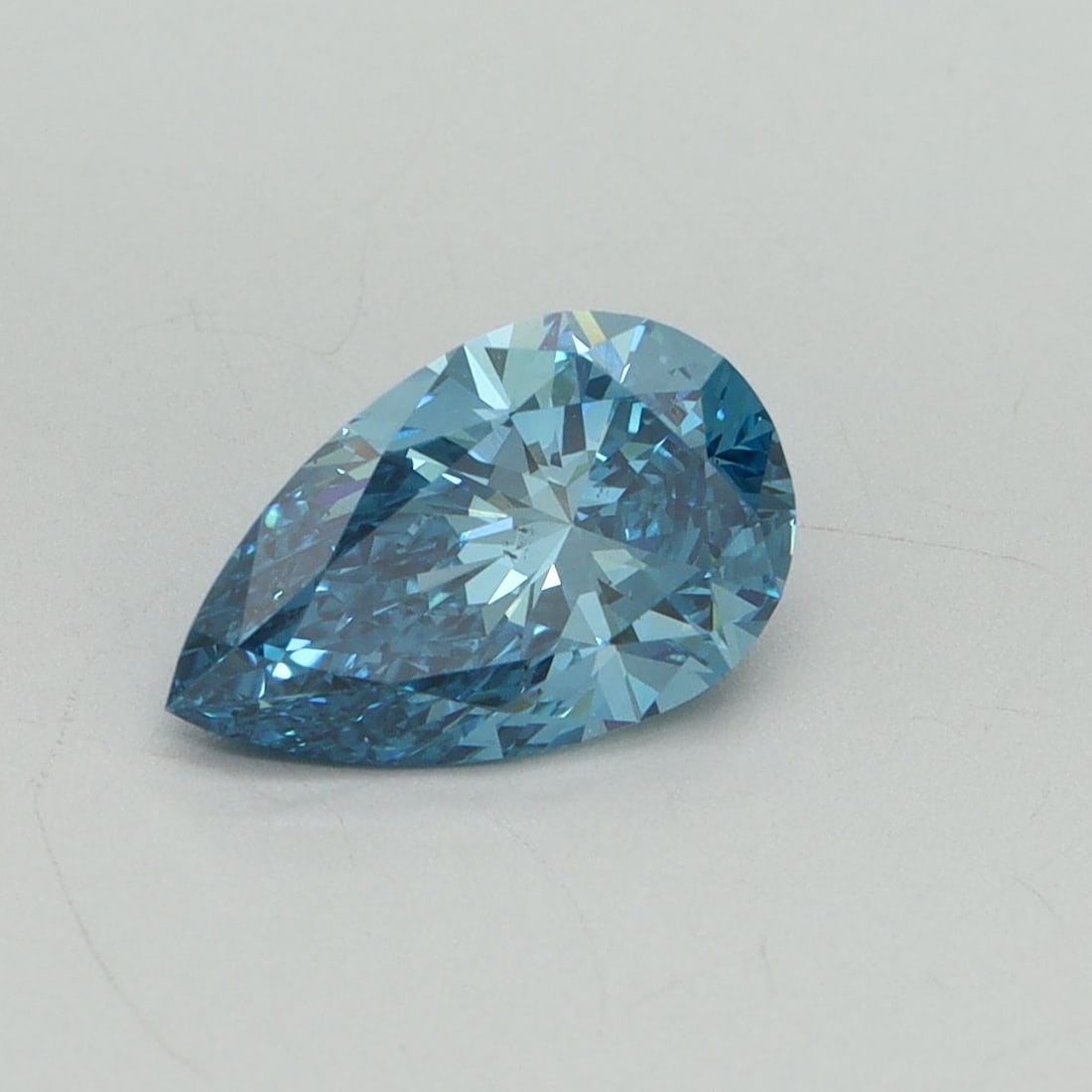 Loose Diamond - PEAR 1.22ct Fancy Vivid Blue VS2: Loose Diamond - PEAR 1.22ct Fancy Vivid Blue VS2 Source: This is a real non-mined Diamond that has been grown in a lab Shape: PEAR Carats: 1.22 Color: Fancy Vivid Blue Certification: IGI Video: