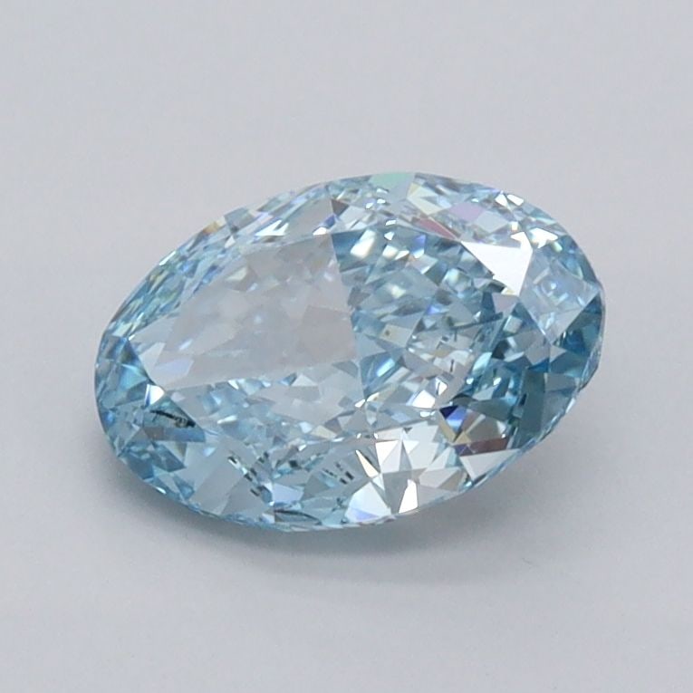 Loose Diamond - OVAL 1.03ct Fancy Vivid Blue VVS2: Loose Diamond - OVAL 1.03ct Fancy Vivid Blue VVS2 Source: This is a real non-mined Diamond that has been grown in a lab Shape: OVAL Carats: 1.03 Color: Fancy Vivid Blue Certification: IGI Video: