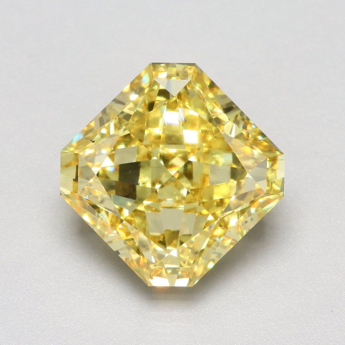 Loose Diamond - SQUARE RADIANT 7.0ct Fancy Vivid Yellow VS2: Loose Diamond - SQUARE RADIANT 7.0ct Fancy Vivid Yellow VS2 Source: This is a real non-mined Diamond that has been grown in a lab Shape: SQUARE RADIANT Carats: 7.0 Color: Fancy Vivid Yellow Certificat