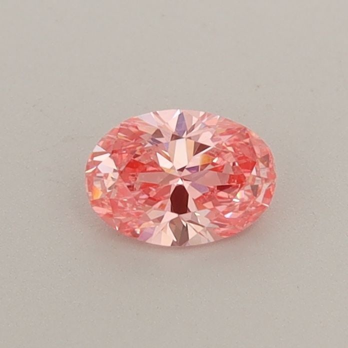 Loose Diamond - OVAL 0.35ct Fancy Vivid Pink VVS2: Loose Diamond - OVAL 0.35ct Fancy Vivid Pink VVS2 Source: This is a real non-mined Diamond that has been grown in a lab Shape: OVAL Carats: 0.35 Color: Fancy Vivid Pink Certification: IGI Video: