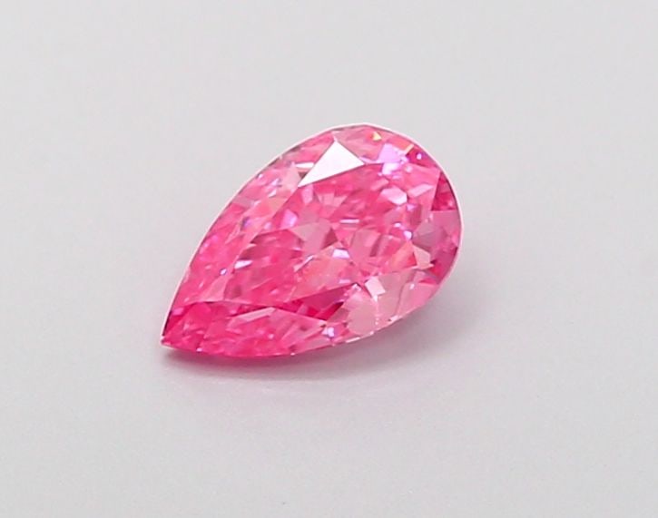 Loose Diamond - PEAR 0.46ct Fancy Vivid Pink VS2: Loose Diamond - PEAR 0.46ct Fancy Vivid Pink VS2 Source: This is a real non-mined Diamond that has been grown in a lab Shape: PEAR Carats: 0.46 Color: Fancy Vivid Pink Certification: IGI Video: