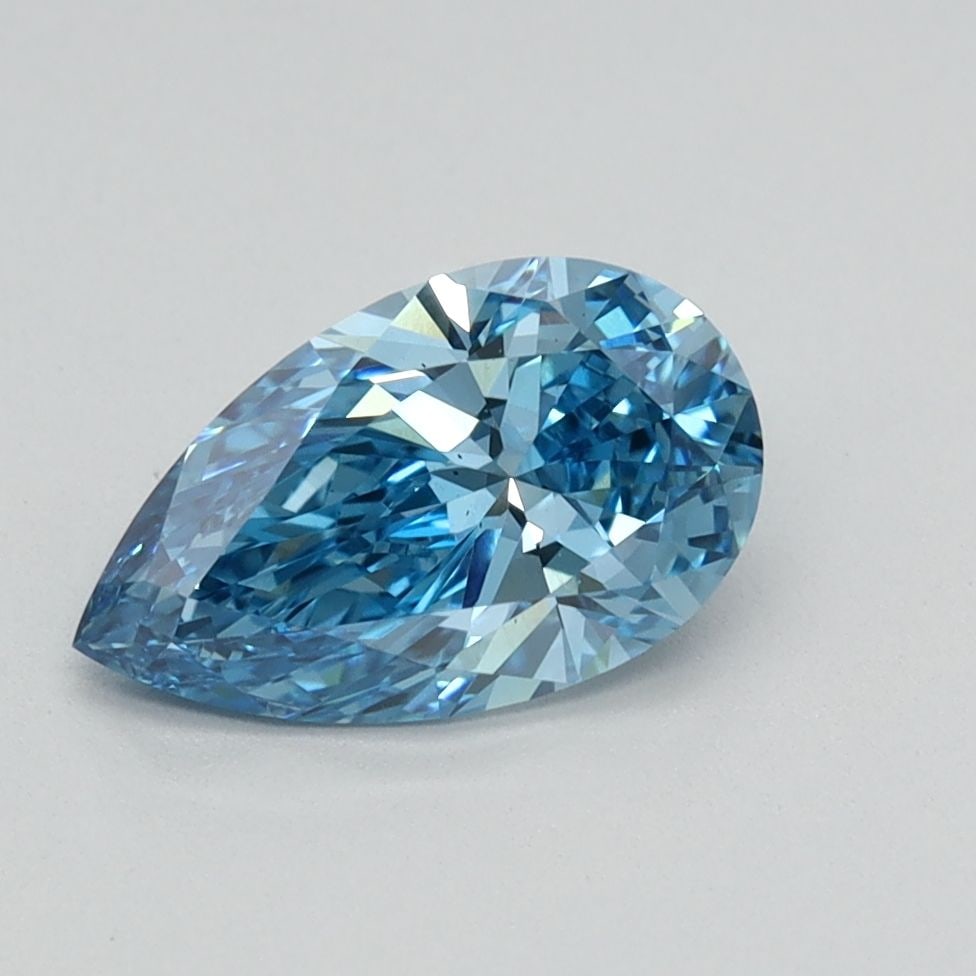 Loose Diamond - PEAR 0.91ct Fancy Vivid Blue VS1: Loose Diamond - PEAR 0.91ct Fancy Vivid Blue VS1 Source: This is a real non-mined Diamond that has been grown in a lab Shape: PEAR Carats: 0.91 Color: Fancy Vivid Blue Certification: IGI Video: