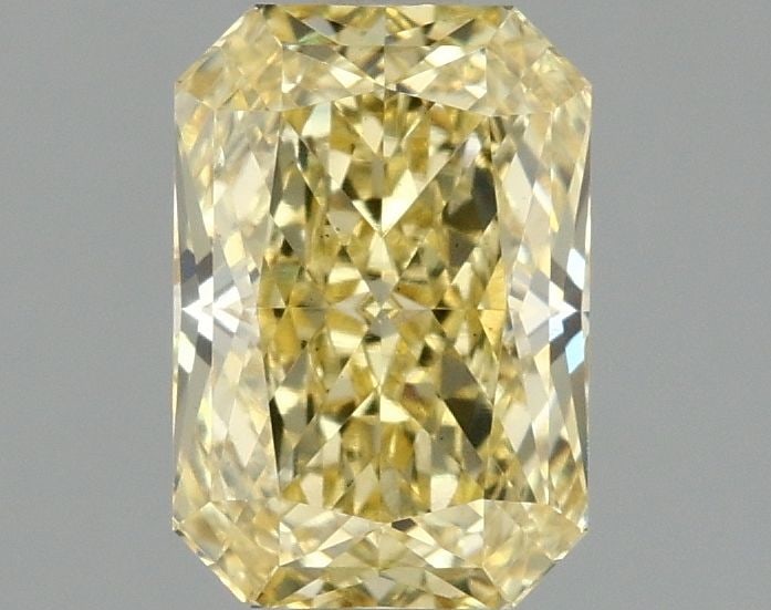Loose Diamond - RADIANT 1.58ct Fancy Vivid Yellow VS1: Loose Diamond - RADIANT 1.58ct Fancy Vivid Yellow VS1 Source: This is a real non-mined Diamond that has been grown in a lab Shape: RADIANT Carats: 1.58 Color: Fancy Vivid Yellow Certification: IGI Vid