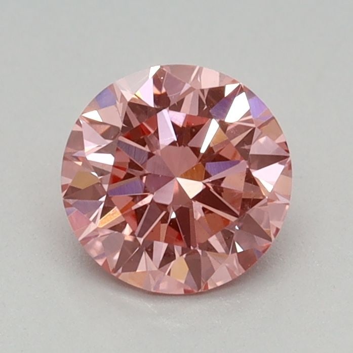 Loose Diamond - ROUND 0.44ct Fancy Vivid Pink VS1: Loose Diamond - ROUND 0.44ct Fancy Vivid Pink VS1 Source: This is a real non-mined Diamond that has been grown in a lab Shape: ROUND Carats: 0.44 Color: Fancy Vivid Pink Certification: IGI Video: