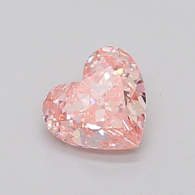Loose Diamond - HEART 1.01ct Fancy Pinkish Orange VS1: Loose Diamond - HEART 1.01ct Fancy Pinkish Orange VS1 Source: This is a real non-mined Diamond that has been grown in a lab Shape: HEART Carats: 1.01 Color: Fancy Pinkish Orange Certification: IGI Vid