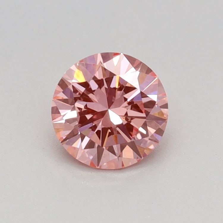 Loose Diamond - ROUND 0.39ct Fancy Vivid Pink VS1: Loose Diamond - ROUND 0.39ct Fancy Vivid Pink VS1 Source: This is a real non-mined Diamond that has been grown in a lab Shape: ROUND Carats: 0.39 Color: Fancy Vivid Pink Certification: IGI Video: