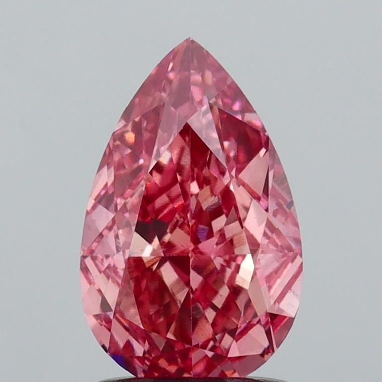 Loose Diamond - PEAR 1.54ct Fancy Vivid Pink VS1: Loose Diamond - PEAR 1.54ct Fancy Vivid Pink VS1 Source: This is a real non-mined Diamond that has been grown in a lab Shape: PEAR Carats: 1.54 Color: Fancy Vivid Pink Certification: IGI Video: