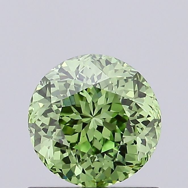 Loose Diamond - ROUND 0.72ct Fancy Vivid Green VS1: Loose Diamond - ROUND 0.72ct Fancy Vivid Green VS1 Source: This is a real non-mined Diamond that has been grown in a lab Shape: ROUND Carats: 0.72 Color: Fancy Vivid Green Certification: IGI Video: