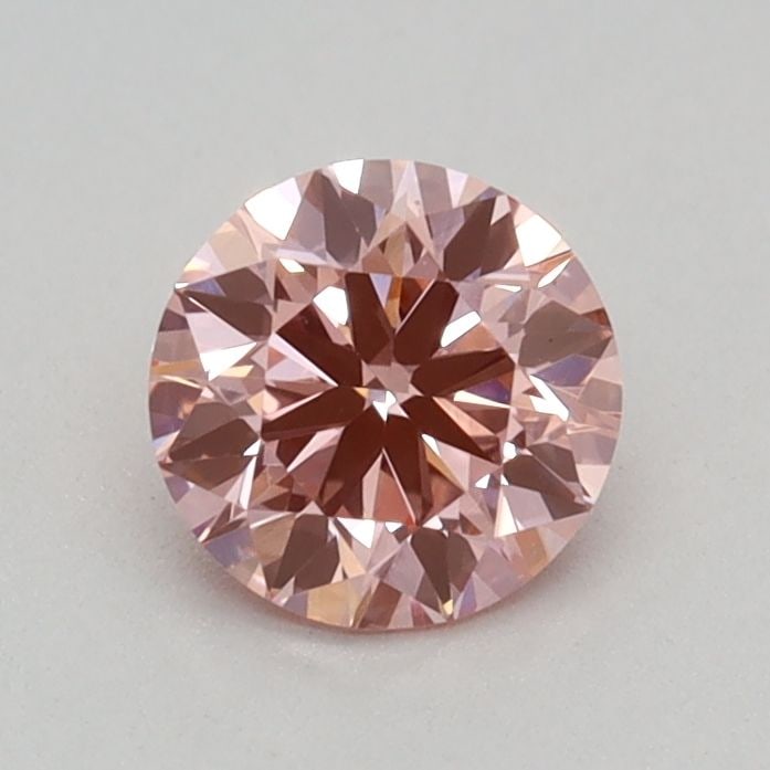 Loose Diamond - ROUND 0.35ct Fancy Vivid Pink VVS2: Loose Diamond - ROUND 0.35ct Fancy Vivid Pink VVS2 Source: This is a real non-mined Diamond that has been grown in a lab Shape: ROUND Carats: 0.35 Color: Fancy Vivid Pink Certification: IGI Video: