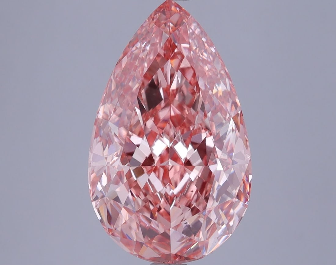 Loose Diamond - PEAR 5.51ct Fancy Vivid Pink VS2: Loose Diamond - PEAR 5.51ct Fancy Vivid Pink VS2 Source: This is a real non-mined Diamond that has been grown in a lab Shape: PEAR Carats: 5.51 Color: Fancy Vivid Pink Certification: IGI Video: