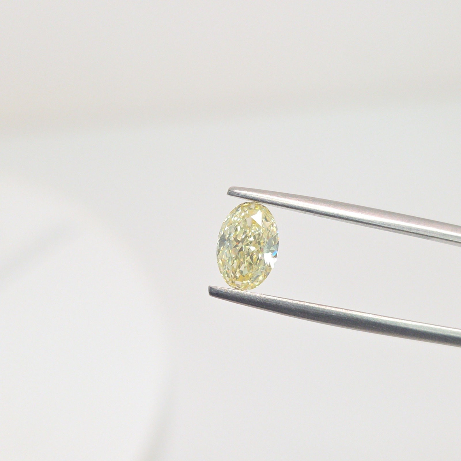 Loose Diamond - OVAL 1.02ct Fancy Light Yellow VS2: Loose Diamond - OVAL 1.02ct Fancy Light Yellow VS2 Source: This is a real non-mined Diamond that has been grown in a lab Shape: OVAL Carats: 1.02 Color: Fancy Light Yellow Certification: IGI Video: