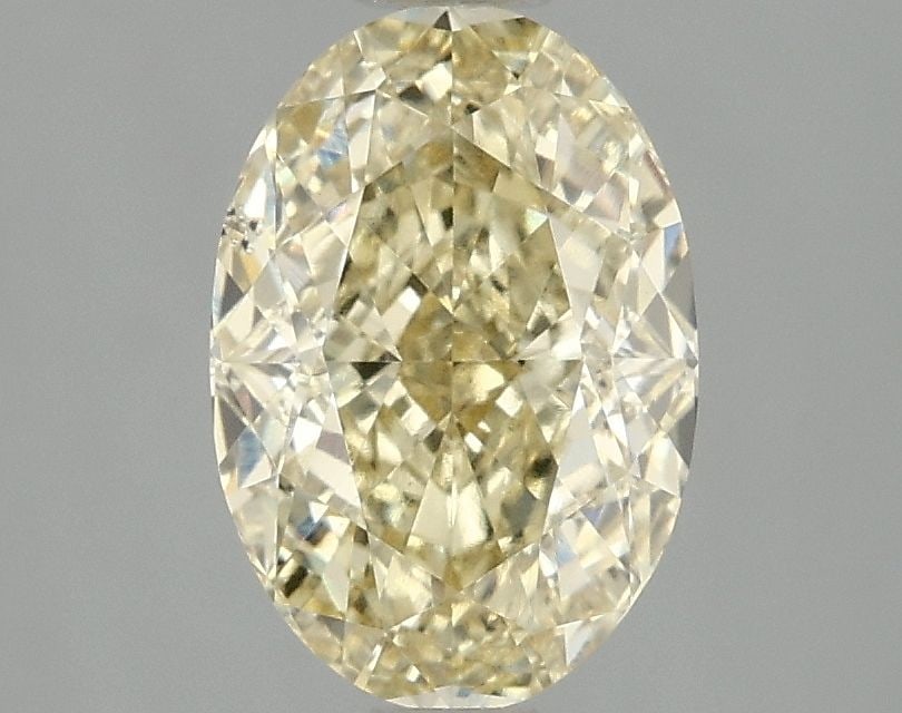 Loose Diamond - OVAL 2.1ct Fancy Intense Yellow SI1: Loose Diamond - OVAL 2.1ct Fancy Intense Yellow SI1 Source: This is a real non-mined Diamond that has been grown in a lab Shape: OVAL Carats: 2.1 Color: Fancy Intense Yellow Certification: IGI Video: