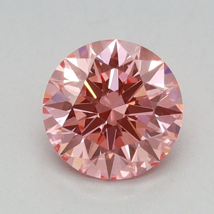 Ideal Loose Diamond - ROUND 0.59ct Fancy Vivid Pink VVS2: Ideal Loose Diamond - ROUND 0.59ct Fancy Vivid Pink VVS2 Source: This is a real non-mined Diamond that has been grown in a lab Shape: ROUND Carats: 0.59 Color: Fancy Vivid Pink Certification: IGI Vide