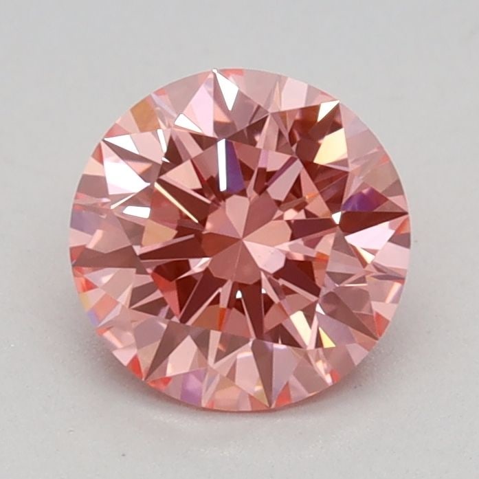 Ideal Loose Diamond - ROUND 0.76ct Fancy Vivid Pink VS1: Ideal Loose Diamond - ROUND 0.76ct Fancy Vivid Pink VS1 Source: This is a real non-mined Diamond that has been grown in a lab Shape: ROUND Carats: 0.76 Color: Fancy Vivid Pink Certification: IGI Video