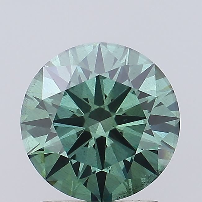 Ideal Loose Diamond - ROUND 1.46ct Fancy Vivid Green SI2: Ideal Loose Diamond - ROUND 1.46ct Fancy Vivid Green SI2 Source: This is a real non-mined Diamond that has been grown in a lab Shape: ROUND Carats: 1.46 Color: Fancy Vivid Green Certification: IGI Vid