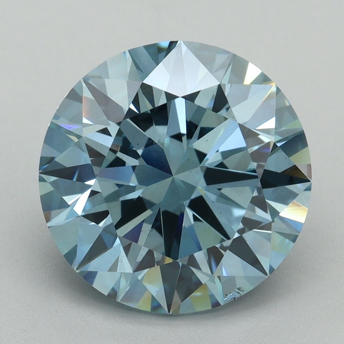 Ideal Loose Diamond - ROUND 6.01ct Fancy Vivid Blue VS2: Ideal Loose Diamond - ROUND 6.01ct Fancy Vivid Blue VS2 Source: This is a real non-mined Diamond that has been grown in a lab Shape: ROUND Carats: 6.01 Color: Fancy Vivid Blue Certification: IGI Video