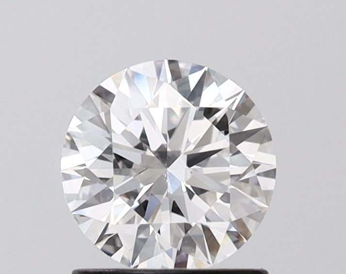 Ideal Loose Diamond - ROUND 1.03ct E VVS2: Ideal Loose Diamond - ROUND 1.03ct E VVS2 Source: This is a real non-mined Diamond that has been grown in a lab Shape: ROUND Carats: 1.03 Color: E Clarity: VVS2 Certification: IGI Video: