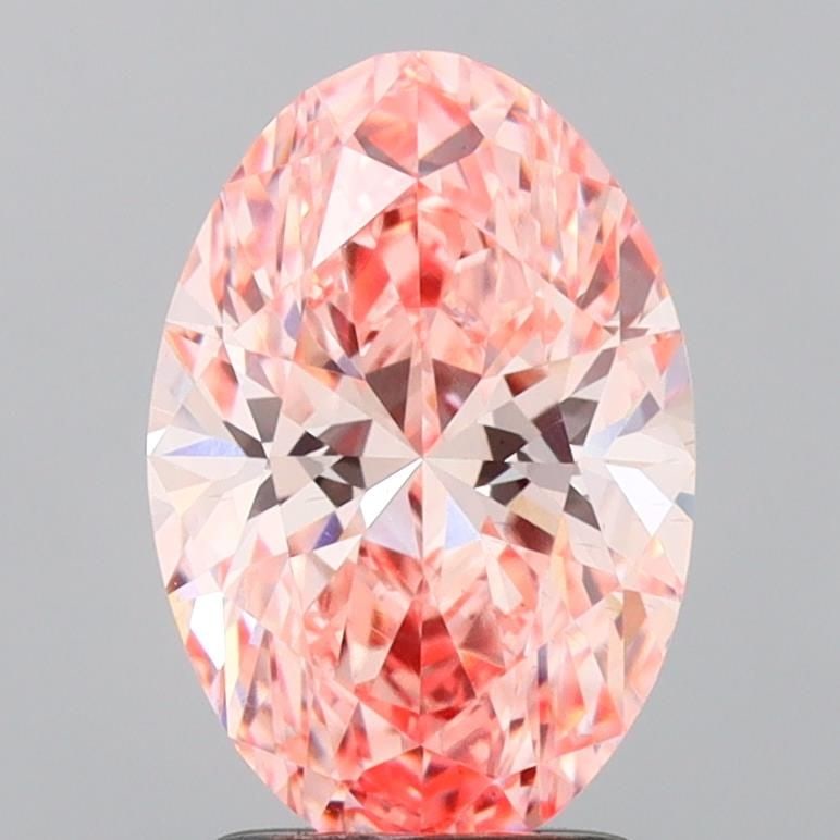 Loose Diamond - OVAL 2.1ct Fancy Vivid Pink VS1: Loose Diamond - OVAL 2.1ct Fancy Vivid Pink VS1 Source: This is a real non-mined Diamond that has been grown in a lab Shape: OVAL Carats: 2.1 Color: Fancy Vivid Pink Certification: IGI Video: