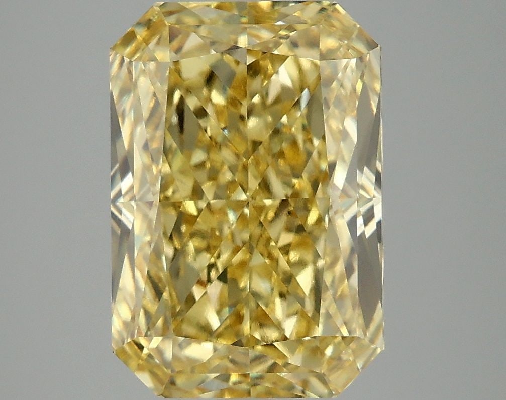 Loose Diamond - RADIANT 5.07ct Fancy Vivid Yellow VS1: Loose Diamond - RADIANT 5.07ct Fancy Vivid Yellow VS1 Source: This is a real non-mined Diamond that has been grown in a lab Shape: RADIANT Carats: 5.07 Color: Fancy Vivid Yellow Certification: IGI Vid