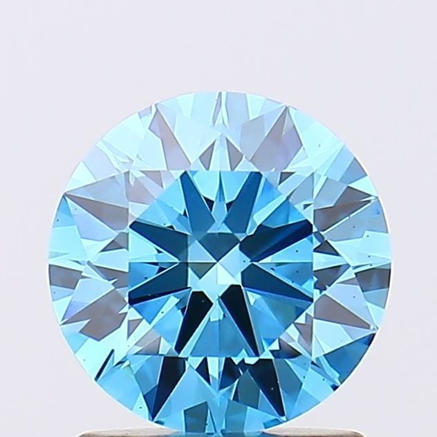 Ideal Loose Diamond - ROUND 1.31ct Fancy Vivid Blue VS1: Ideal Loose Diamond - ROUND 1.31ct Fancy Vivid Blue VS1 Source: This is a real non-mined Diamond that has been grown in a lab Shape: ROUND Carats: 1.31 Color: Fancy Vivid Blue Certification: IGI Video