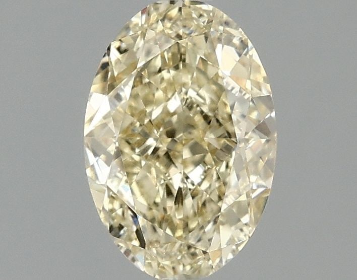Loose Diamond - OVAL 1.45ct Fancy Intense Yellow VVS2: Loose Diamond - OVAL 1.45ct Fancy Intense Yellow VVS2 Source: This is a real non-mined Diamond that has been grown in a lab Shape: OVAL Carats: 1.45 Color: Fancy Intense Yellow Certification: IGI Vide