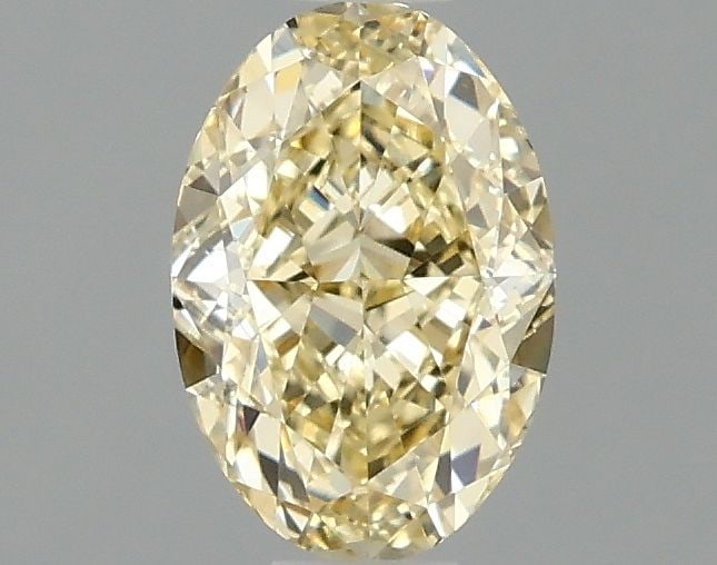 Loose Diamond - OVAL 1.05ct Fancy Yellow VS1: Loose Diamond - OVAL 1.05ct Fancy Yellow VS1 Source: This is a real non-mined Diamond that has been grown in a lab Shape: OVAL Carats: 1.05 Color: Fancy Yellow Certification: IGI Video: