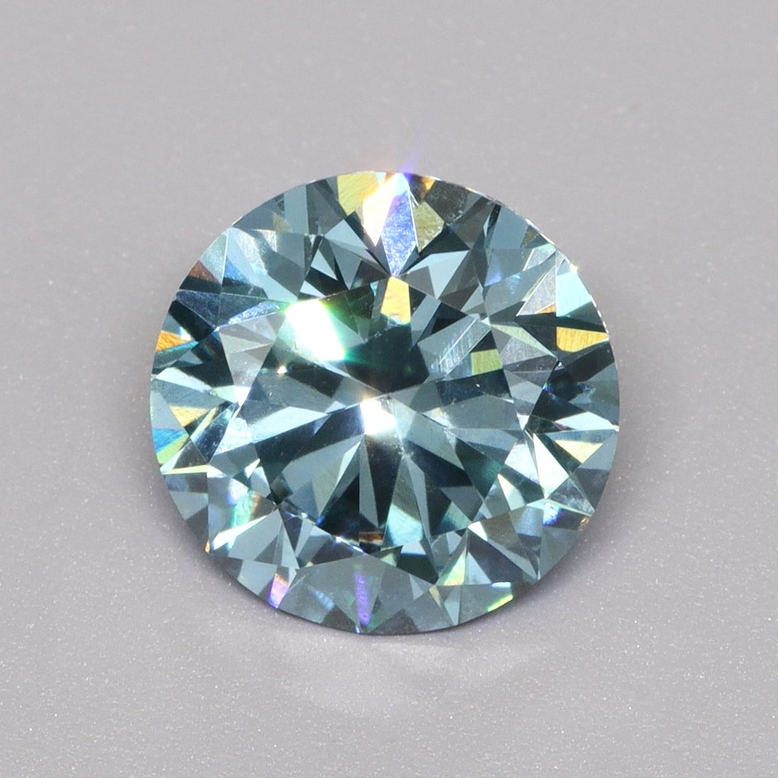 Loose Diamond - ROUND 1.55ct Fancy Vivid Blue VS2: Loose Diamond - ROUND 1.55ct Fancy Vivid Blue VS2 Source: This is a real non-mined Diamond that has been grown in a lab Shape: ROUND Carats: 1.55 Color: Fancy Vivid Blue Certification: IGI Video: