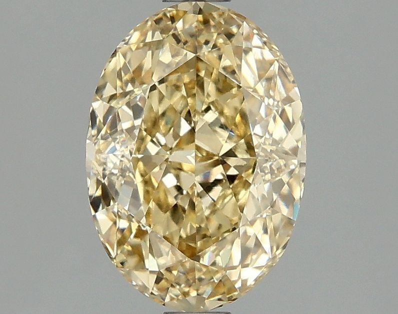 Loose Diamond - OVAL 2.1ct Fancy Intense Yellow VVS2: Loose Diamond - OVAL 2.1ct Fancy Intense Yellow VVS2 Source: This is a real non-mined Diamond that has been grown in a lab Shape: OVAL Carats: 2.1 Color: Fancy Intense Yellow Certification: IGI Video: