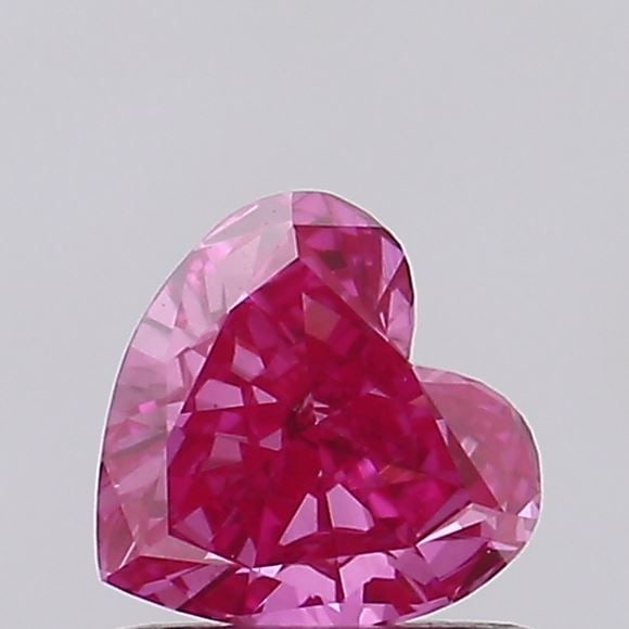 Loose Diamond - HEART 0.54ct Fancy Vivid Pink VS2: Loose Diamond - HEART 0.54ct Fancy Vivid Pink VS2 Source: This is a real non-mined Diamond that has been grown in a lab Shape: HEART Carats: 0.54 Color: Fancy Vivid Pink Certification: IGI Video: