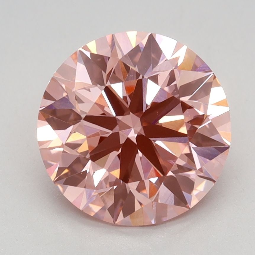 Ideal Loose Diamond - ROUND 2.18ct Fancy Vivid Pink VS1: Ideal Loose Diamond - ROUND 2.18ct Fancy Vivid Pink VS1 Source: This is a real non-mined Diamond that has been grown in a lab Shape: ROUND Carats: 2.18 Color: Fancy Vivid Pink Certification: IGI Video