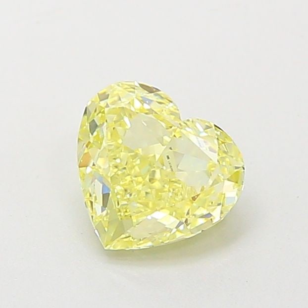 Loose Diamond - HEART 1.0ct Fancy Yellow VS2: Loose Diamond - HEART 1.0ct Fancy Yellow VS2 Source: This is a real non-mined Diamond that has been grown in a lab Shape: HEART Carats: 1.0 Color: Fancy Yellow Certification: IGI Video: