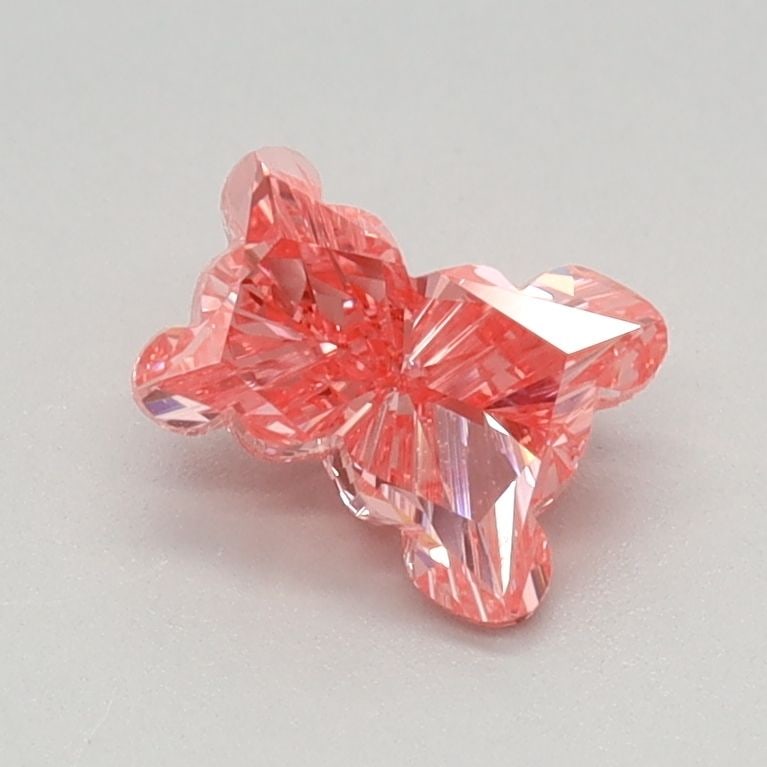 Loose Diamond - OTHER 0.67ct Fancy Vivid Pink VVS2: Loose Diamond - OTHER 0.67ct Fancy Vivid Pink VVS2 Source: This is a real non-mined Diamond that has been grown in a lab Shape: OTHER Carats: 0.67 Color: Fancy Vivid Pink Certification: IGI Video: