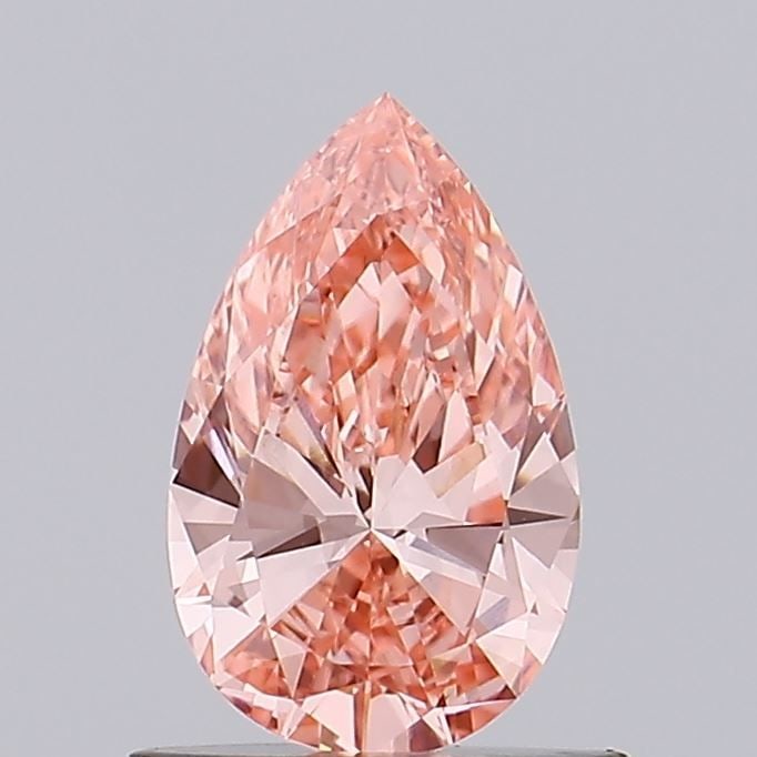 Loose Diamond - PEAR 0.69ct Fancy Vivid Pink VS1: Loose Diamond - PEAR 0.69ct Fancy Vivid Pink VS1 Source: This is a real non-mined Diamond that has been grown in a lab Shape: PEAR Carats: 0.69 Color: Fancy Vivid Pink Certification: IGI Video: Video