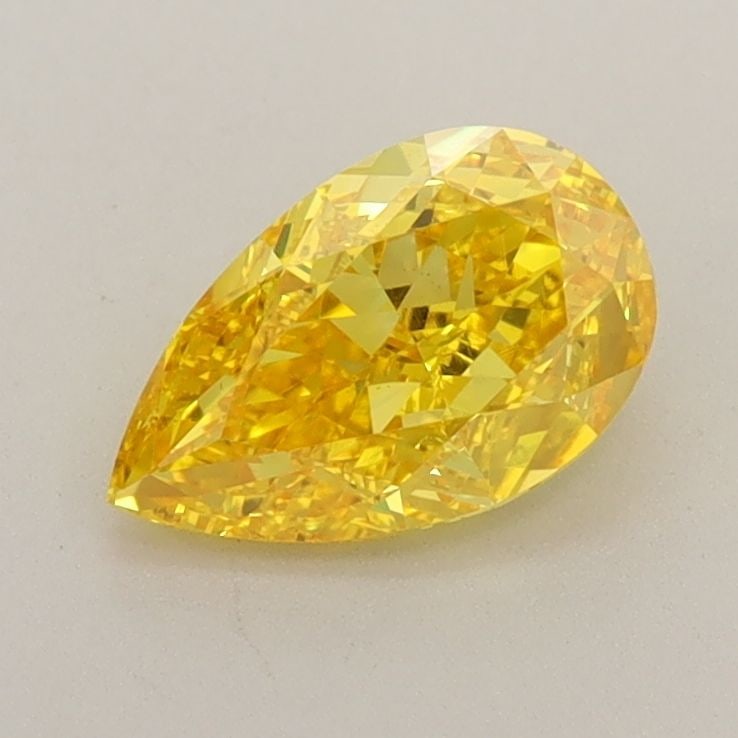 Loose Diamond - PEAR 0.99ct Fancy Vivid Yellow VS2: Loose Diamond - PEAR 0.99ct Fancy Vivid Yellow VS2 Source: This is a real non-mined Diamond that has been grown in a lab Shape: PEAR Carats: 0.99 Color: Fancy Vivid Yellow Certification: IGI Video: