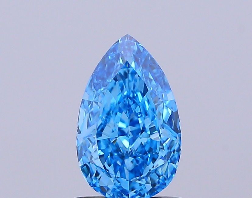Loose Diamond - PEAR 1.22ct Fancy Vivid Blue VS1: Loose Diamond - PEAR 1.22ct Fancy Vivid Blue VS1 Source: This is a real non-mined Diamond that has been grown in a lab Shape: PEAR Carats: 1.22 Color: Fancy Vivid Blue Certification: IGI Video: