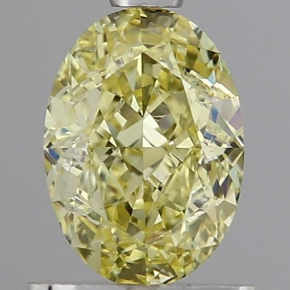 Loose Diamond - OVAL 1.03ct Fancy Yellow VS1: Loose Diamond - OVAL 1.03ct Fancy Yellow VS1 Source: This is a real non-mined Diamond that has been grown in a lab Shape: OVAL Carats: 1.03 Color: Fancy Yellow Certification: IGI Video: