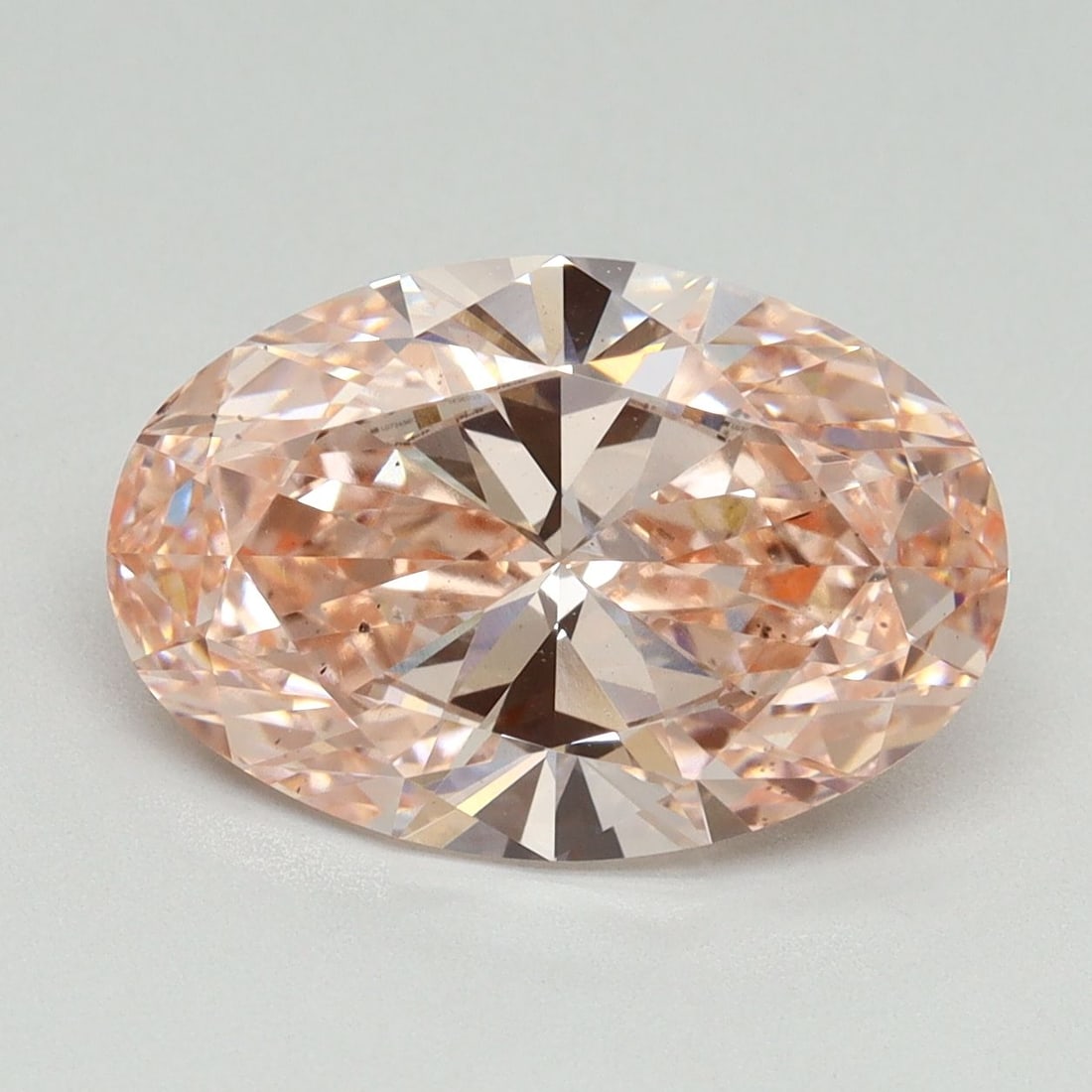 Loose Diamond - OVAL 4.18ct Fancy Vivid Pink VS2: Loose Diamond - OVAL 4.18ct Fancy Vivid Pink VS2 Source: This is a real non-mined Diamond that has been grown in a lab Shape: OVAL Carats: 4.18 Color: Fancy Vivid Pink Certification: IGI Video: