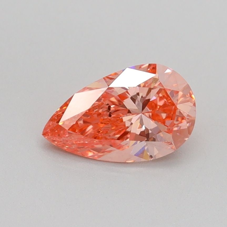 Loose Diamond - PEAR 0.7ct Fancy Vivid Pink SI1: Loose Diamond - PEAR 0.7ct Fancy Vivid Pink SI1 Source: This is a real non-mined Diamond that has been grown in a lab Shape: PEAR Carats: 0.7 Color: Fancy Vivid Pink Certification: IGI Video: