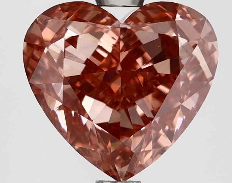 Loose Diamond - HEART 3.07ct Fancy Vivid Brownish Pink VS2: Loose Diamond - HEART 3.07ct Fancy Vivid Brownish Pink VS2 Source: This is a real non-mined Diamond that has been grown in a lab Shape: HEART Carats: 3.07 Color: Fancy Vivid Brownish Pink Certificatio