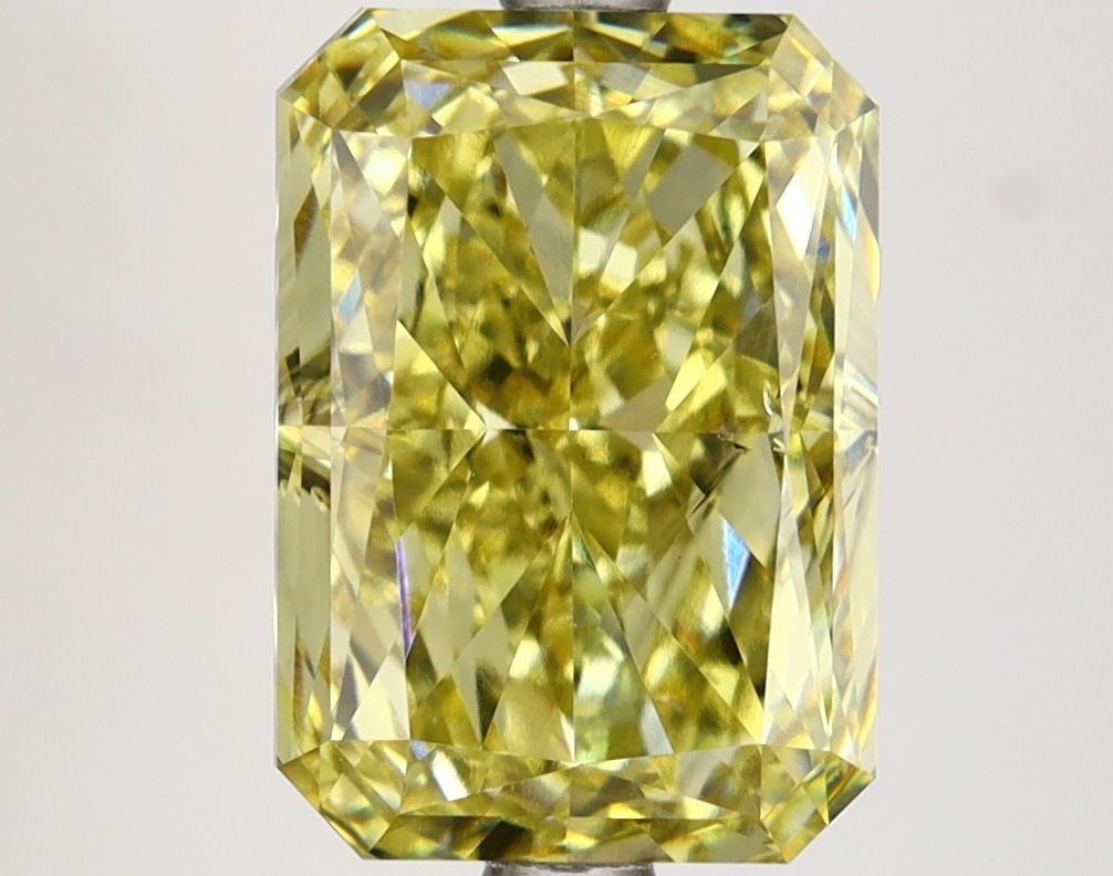 Loose Diamond - RADIANT 4.05ct Fancy Vivid Yellow VS2: Loose Diamond - RADIANT 4.05ct Fancy Vivid Yellow VS2 Source: This is a real non-mined Diamond that has been grown in a lab Shape: RADIANT Carats: 4.05 Color: Fancy Vivid Yellow Certification: IGI Vid