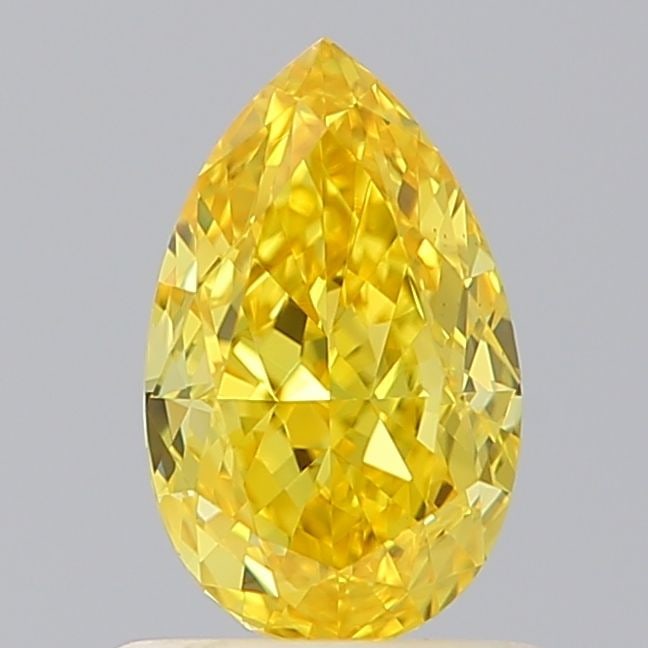 Loose Diamond - PEAR 0.99ct Fancy Vivid Yellow VS1: Loose Diamond - PEAR 0.99ct Fancy Vivid Yellow VS1 Source: This is a real non-mined Diamond that has been grown in a lab Shape: PEAR Carats: 0.99 Color: Fancy Vivid Yellow Certification: IGI Video: