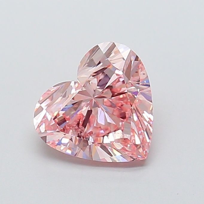 Loose Diamond - HEART 3.0ct Fancy Vivid Pink VS2: Loose Diamond - HEART 3.0ct Fancy Vivid Pink VS2 Source: This is a real non-mined Diamond that has been grown in a lab Shape: HEART Carats: 3.0 Color: Fancy Vivid Pink Certification: IGI Video: