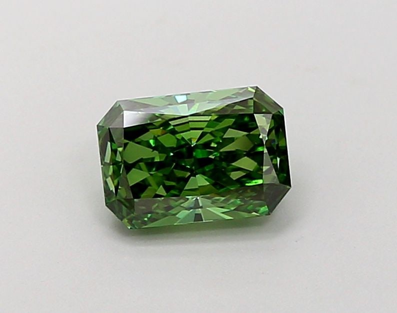 Loose Diamond - RADIANT 1.03ct Fancy Vivid Green VVS2: Loose Diamond - RADIANT 1.03ct Fancy Vivid Green VVS2 Source: This is a real non-mined Diamond that has been grown in a lab Shape: RADIANT Carats: 1.03 Color: Fancy Vivid Green Certification: IGI Vide