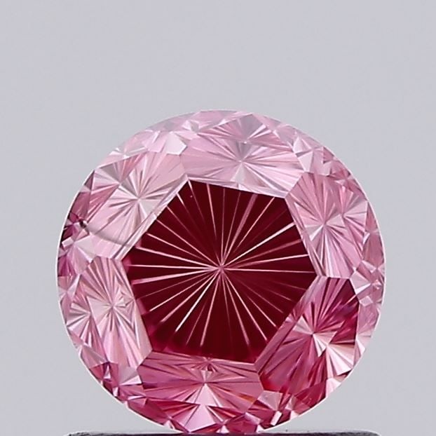 Loose Diamond - ROUND 0.98ct Fancy Vivid Pink VS2: Loose Diamond - ROUND 0.98ct Fancy Vivid Pink VS2 Source: This is a real non-mined Diamond that has been grown in a lab Shape: ROUND Carats: 0.98 Color: Fancy Vivid Pink Certification: IGI Video: