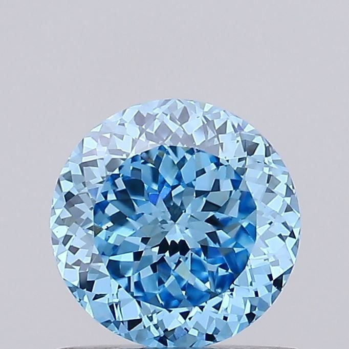 Loose Diamond - ROUND 0.87ct Fancy Vivid Blue VS1: Loose Diamond - ROUND 0.87ct Fancy Vivid Blue VS1 Source: This is a real non-mined Diamond that has been grown in a lab Shape: ROUND Carats: 0.87 Color: Fancy Vivid Blue Certification: IGI Video: