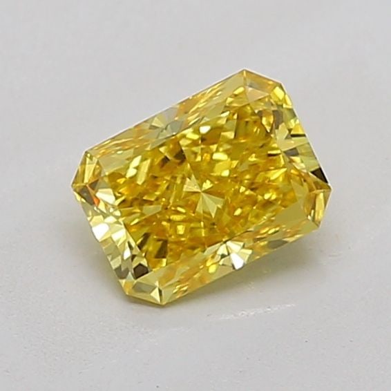 Loose Diamond - RADIANT 0.82ct Fancy Vivid Yellow VS1: Loose Diamond - RADIANT 0.82ct Fancy Vivid Yellow VS1 Source: This is a real non-mined Diamond that has been grown in a lab Shape: RADIANT Carats: 0.82 Color: Fancy Vivid Yellow Certification: IGI Vid