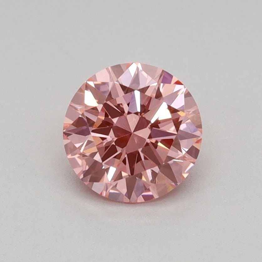 Loose Diamond - ROUND 0.4ct Fancy Vivid Pink VS1: Loose Diamond - ROUND 0.4ct Fancy Vivid Pink VS1 Source: This is a real non-mined Diamond that has been grown in a lab Shape: ROUND Carats: 0.4 Color: Fancy Vivid Pink Certification: IGI Video: