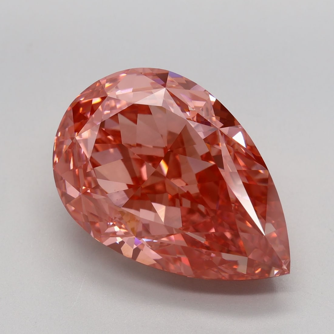 Loose Diamond - PEAR 10.04ct Fancy Vivid Pink VVS2: Loose Diamond - PEAR 10.04ct Fancy Vivid Pink VVS2 Source: This is a real non-mined Diamond that has been grown in a lab Shape: PEAR Carats: 10.04 Color: Fancy Vivid Pink Certification: IGI Video: